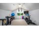 Home exercise room equipped with fitness equipment and a large window for natural light at 574 Chatham Dr, Chapel Hill, NC 27516