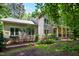 Charming home with well-maintained landscaping and a welcoming front porch in a serene setting at 574 Chatham Dr, Chapel Hill, NC 27516