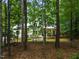 Charming two-story home nestled among trees offers a serene, private setting at 574 Chatham Dr, Chapel Hill, NC 27516