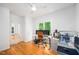 Well-lit office space with hardwood floors, a large window, and ample room for a desk and workspace at 574 Chatham Dr, Chapel Hill, NC 27516
