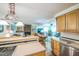 Open floorplan featuring an eat-in kitchen that overlooks the living room area at 582 Wimbleton Dr, Raleigh, NC 27609