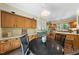 Dining area featuring wood cabinets, access to kitchen and lots of natural light at 5822 Country Lane Dr, Durham, NC 27705