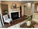 Comfortable living room with fireplace and built in shelving with decoratives at 600 Audobon Lake Dr # One B21, Durham, NC 27713