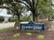 Community entrance sign for Brandon Ridge with lush greenery and mature trees at 600 Audobon Lake Dr # One B21, Durham, NC 27713