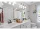 Bathroom features double sinks and neutral design at 6032 Epping Forest Dr, Raleigh, NC 27613