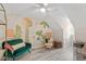 Stylish bedroom with vaulted ceiling, decorative wall art, and comfortable seating at 6032 Epping Forest Dr, Raleigh, NC 27613