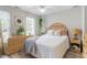 Comfortable bedroom with natural light and cozy furnishings at 6032 Epping Forest Dr, Raleigh, NC 27613