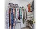 Walk-in closet with ample storage space, shelving, and rods for clothing and accessories at 6032 Epping Forest Dr, Raleigh, NC 27613