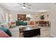 Open-concept living and dining area with ample natural light and modern furnishings at 6032 Epping Forest Dr, Raleigh, NC 27613