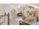 Upstairs sitting room with statement art and natural light at 6032 Epping Forest Dr, Raleigh, NC 27613