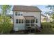 A charming home boasts a screened-in porch overlooking the grassy, fenced backyard at 604 Craftsman Ridge Trail Trl, Knightdale, NC 27545