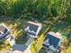 An aerial view displaying the home nestled within a beautifully landscaped neighborhood at 6404 Fauvette Lane Ln, Holly Springs, NC 27540