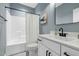Modern bathroom with marble vanity, shower and black fixtures at 6404 Fauvette Lane Ln, Holly Springs, NC 27540