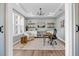 Bright office with ample natural light, built-in shelving, and a comfortable workspace for productivity and creativity at 6404 Fauvette Lane Ln, Holly Springs, NC 27540
