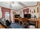 Bedroom with desk space, carpeting, ceiling fan, and natural light at 70 Fieldside Dr, Louisburg, NC 27549