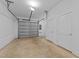 An attached garage with a door and plenty of space for parking and storage at 710 W North St # 102, Raleigh, NC 27603