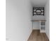 Dedicated office nook features built-in desk with shelving at 710 W North St # 102, Raleigh, NC 27603