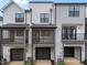 Rear exterior featuring screened-in porch and balcony, ideal for relaxation and outdoor living at 710 W North St # 102, Raleigh, NC 27603