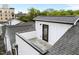 An inviting rooftop patio featuring a door and stylish neutral colored pavers, perfect for outdoor living at 710 W North St # 102, Raleigh, NC 27603