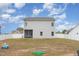 Large backyard featuring a white fence and grass that needs some love at 72 Ina Rose Ln, Four Oaks, NC 27524