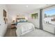 Well-lit bedroom features a bed with stylish pillows and a bedside table with lamps at 740 Deschutes Dr, Garner, NC 27529