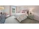 Charming bedroom features a large window with an exterior view and elegant interior design at 740 Deschutes Dr, Garner, NC 27529