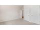 Clean and bright bedroom with neutral carpeting and ample closet space at 79 Bronco Pace Dr, Clayton, NC 27520