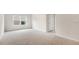 Spacious bedroom features neutral carpet, a window, and a closet at 79 Bronco Pace Dr, Clayton, NC 27520