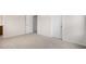 Bedroom with neutral carpet, closet, and access to an ensuite bathroom at 79 Bronco Pace Dr, Clayton, NC 27520