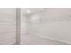 Spacious walk-in closet featuring ample shelving and neutral carpeting at 79 Bronco Pace Dr, Clayton, NC 27520
