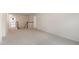 Spacious loft area with neutral carpeting, perfect as a secondary living space at 79 Bronco Pace Dr, Clayton, NC 27520
