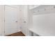 Bright mudroom features a built-in bench with cubbies and coat hooks for organization at 79 Bronco Pace Dr, Clayton, NC 27520