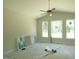 Unfinished bedroom with ceiling fan and lots of natural light at 802 Shade Tree Rd, Benson, NC 27504