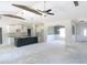 Open living space featuring vaulted ceilings, a kitchen island, and an adjacent dining area at 802 Shade Tree Rd, Benson, NC 27504