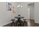 Charming breakfast nook features a round table with seating for three, perfect for casual dining at 8304 Southmoor Hill Trl, Wake Forest, NC 27587