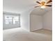 Bright bedroom featuring carpet, ceiling fan and large window with blinds at 9327 Falkwood Rd, Raleigh, NC 27617