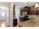 Gourmet kitchen showcasing granite countertops and stainless steel appliances at 9327 Falkwood Rd, Raleigh, NC 27617