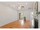 Inviting living room with hardwood floors, fireplace, and access to the outdoors at 9327 Falkwood Rd, Raleigh, NC 27617