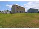 Expansive backyard featuring a well-manicured lawn, ideal for outdoor activities and relaxation at 935 Bombardier Ln, Spring Hope, NC 27882