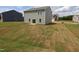 Backyard with newly installed sod and sprinkler system, perfect for outdoor enjoyment at 956 Bombardier Ln, Spring Hope, NC 27882