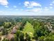 Golf course community aerial view highlights the home's proximity to green spaces at 9603 Clubvalley Way, Raleigh, NC 27617