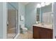 Well-lit bathroom with a glass-enclosed shower, vanity, and neutral color scheme, creating a clean aesthetic at 9603 Clubvalley Way, Raleigh, NC 27617