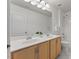 Modern bathroom features double sinks, new countertops and updated fixtures at 9603 Clubvalley Way, Raleigh, NC 27617