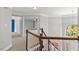 View of the foyer showcasing hardwood stairs, chandelier, and open floor plan at 9603 Clubvalley Way, Raleigh, NC 27617