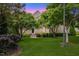 Beautiful front exterior of a brick home with mature landscaping at 9603 Clubvalley Way, Raleigh, NC 27617