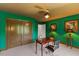Intimate office with a cozy ceiling fan, decorative desk and a nearby window at 9603 Clubvalley Way, Raleigh, NC 27617