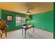 Cozy office with a window, desk, ceiling fan, and decorative touches at 9603 Clubvalley Way, Raleigh, NC 27617