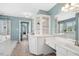 Luxurious bathroom featuring double sinks, a separate shower, and a soaking tub at 100 Wentbridge Rd, Cary, NC 27519