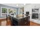 Modern kitchen with island, stainless steel appliances, granite countertops, and ample cabinet space at 100 Wentbridge Rd, Cary, NC 27519