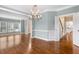 Elegant living and dining area featuring hardwood floors and natural lighting at 100 Wentbridge Rd, Cary, NC 27519